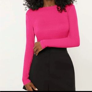 Two long sleeved ribbed shirts